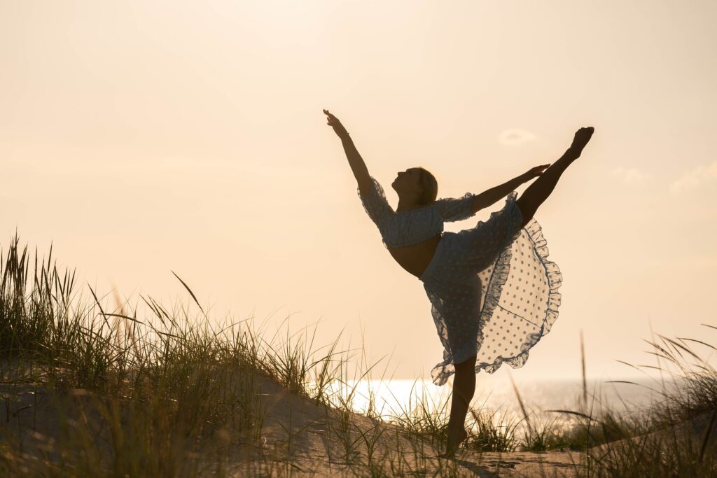 Silhouette of a dancer on the beach in Cape May NJ, dance portraits with Susan Grace Photography