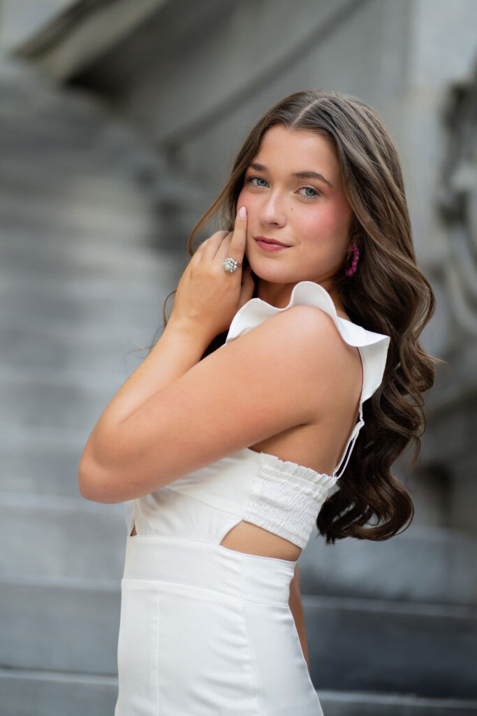 Gorgeous senior in white dress outside a gazebo by Susan Grace photography