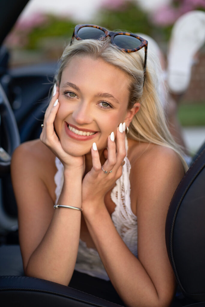 Sunlit image of senior Izzie by senior photographer Susan Grace Photography 