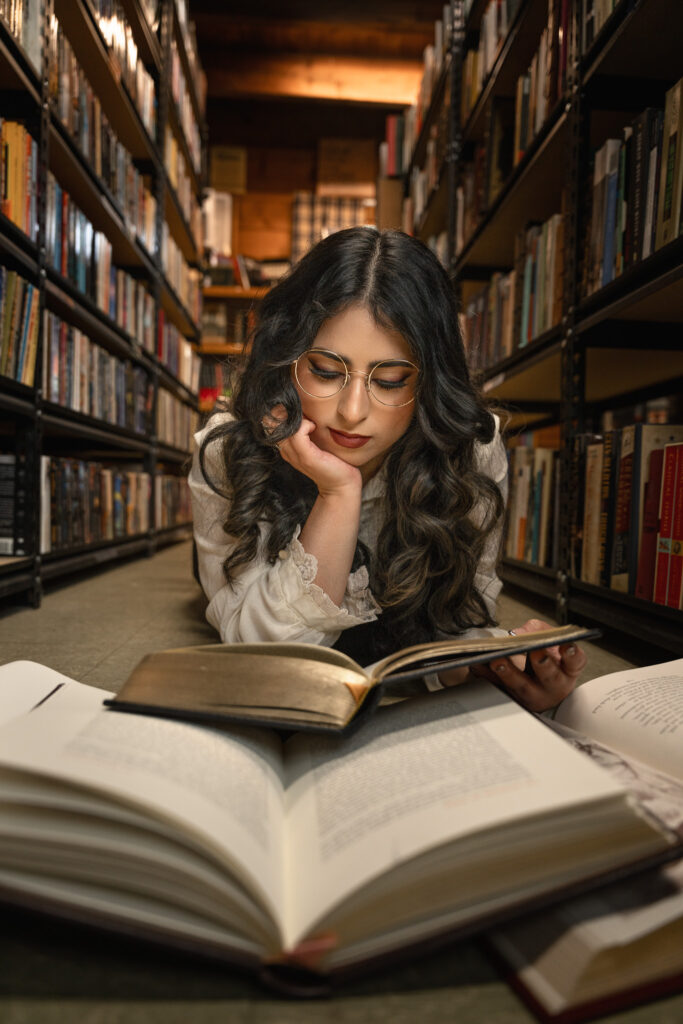Modern senior image in bookshop by NJ photographer Susan Grace